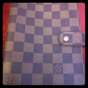 Louis Vuitton organizer 6.5 inches by 4.5 inches